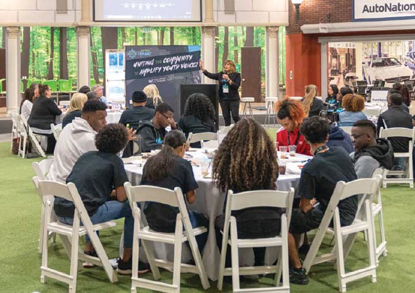 Selfless Love Foundation CEO Elizabeth Wynter leads a youth engagement seminar during an event in 2019.